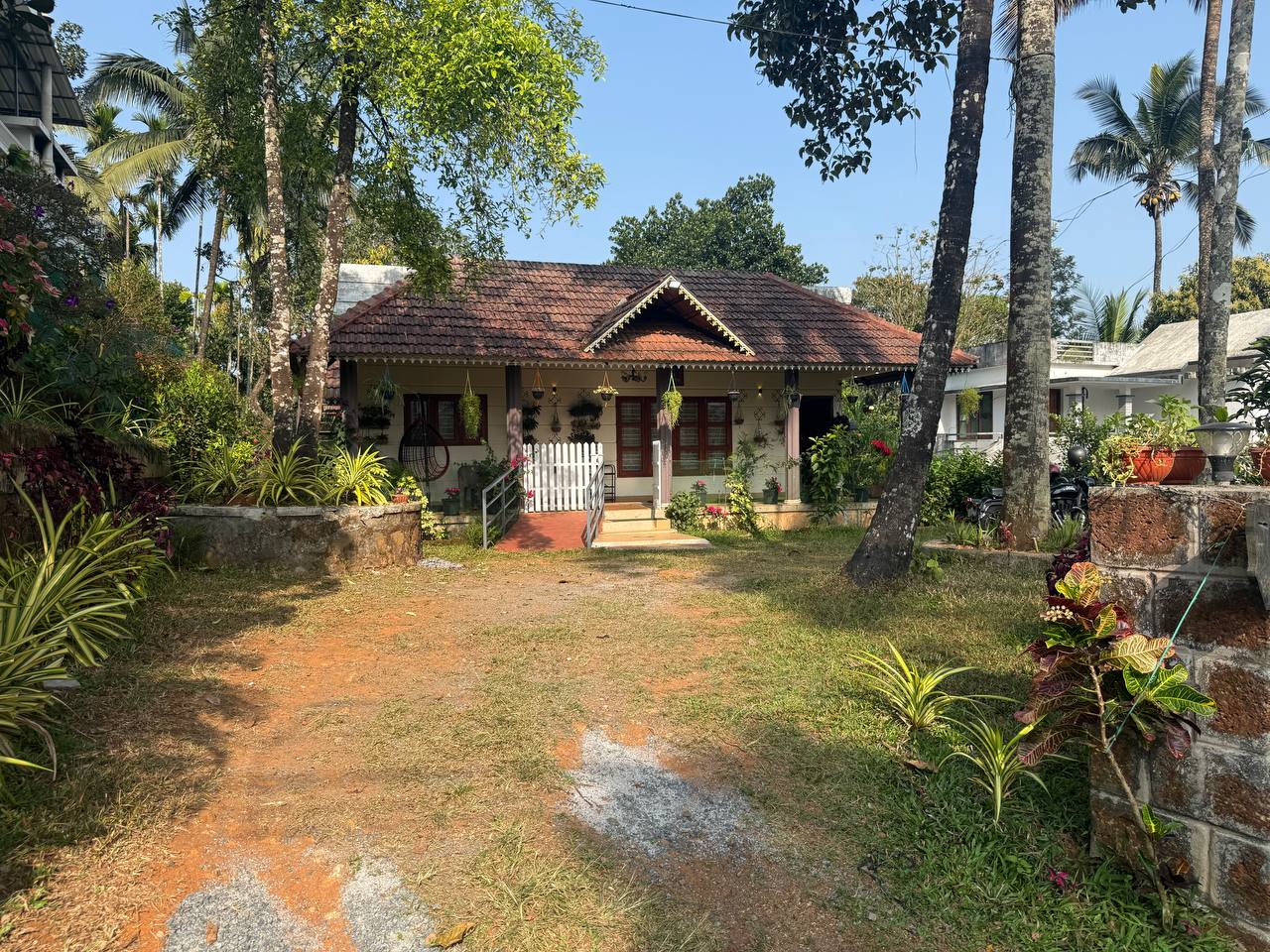 Merchant's Tranquility Home exterior view with lush greenery